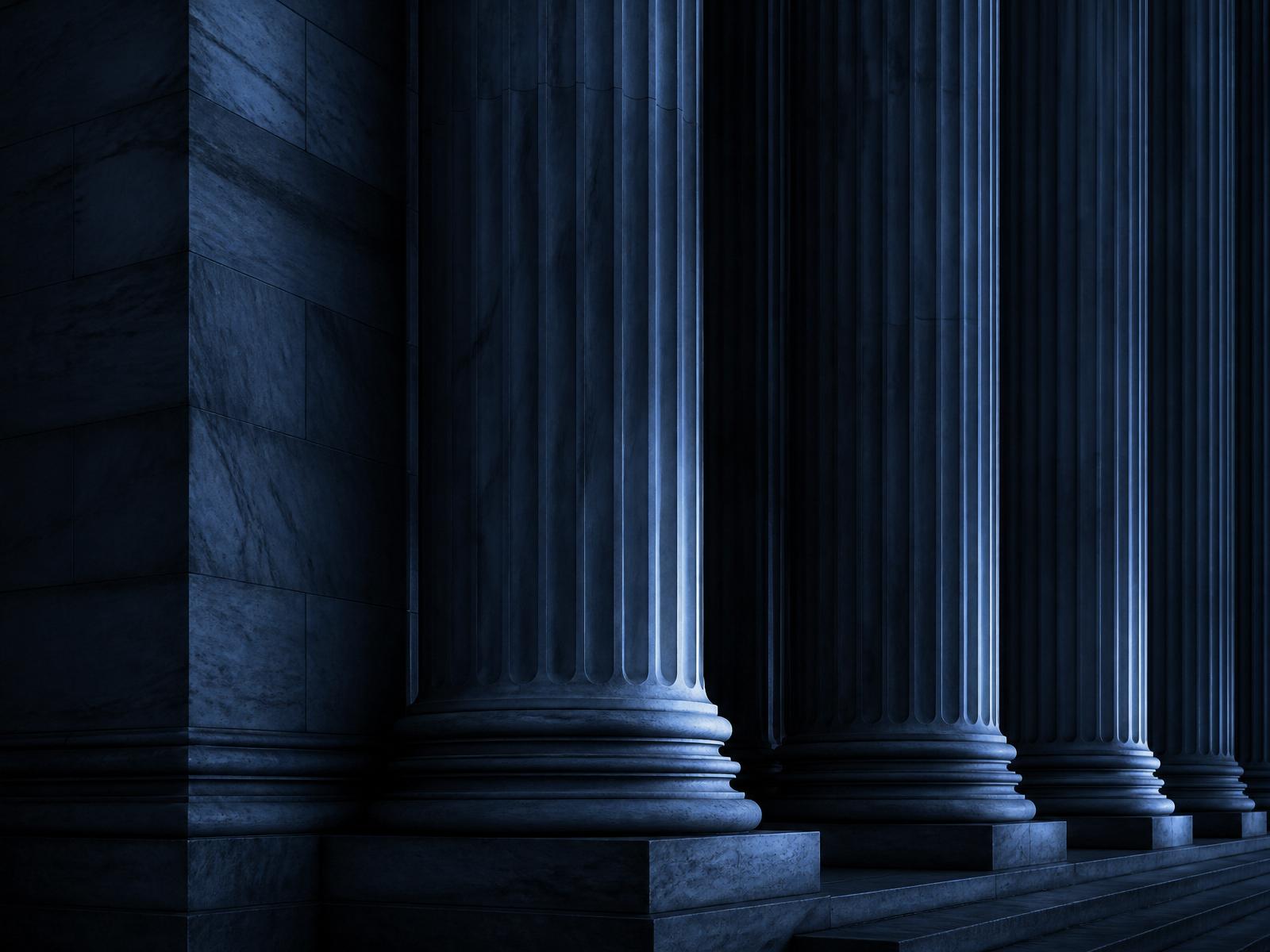 Marble columns representing institutional governance
